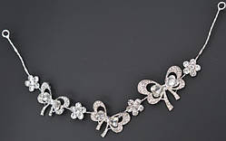 Прикраса для волосся гілочка бантик 3х28 см білий метал білі стрази