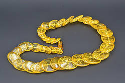 Буси синтетичний бурштин 50 см овал жовтий