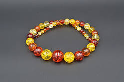 Буси синтетичний бурштин 56 см кулька колір мікс