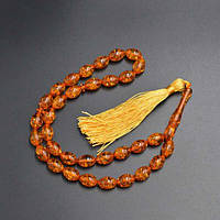 Чітки синтетичний бурштин, колір жовтогарячий, розмір намистини 8х14 мм