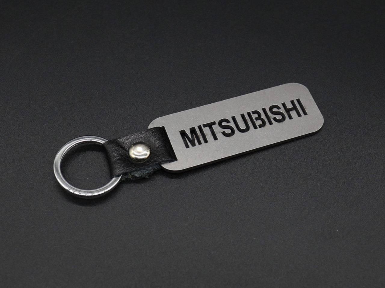 Брелок металевий. Mitsubishi. 10х2,5см
