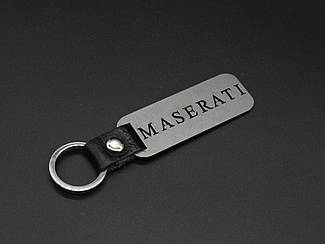 Брелок металевий. Maserati. 10х2,5см