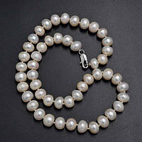 Буси з білих річкових перлів, намистина 10х8 мм, довжина 44 см