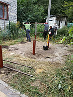 Начало монтажа свай под беседку