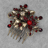 Гребінець для волосся золотистого кольору метелика з червоними стразами та намистинами на 6 зубців розмір 65х53 мм