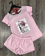 Розовый комплект в пижамном стиле футболка и шорты с аппликацией.