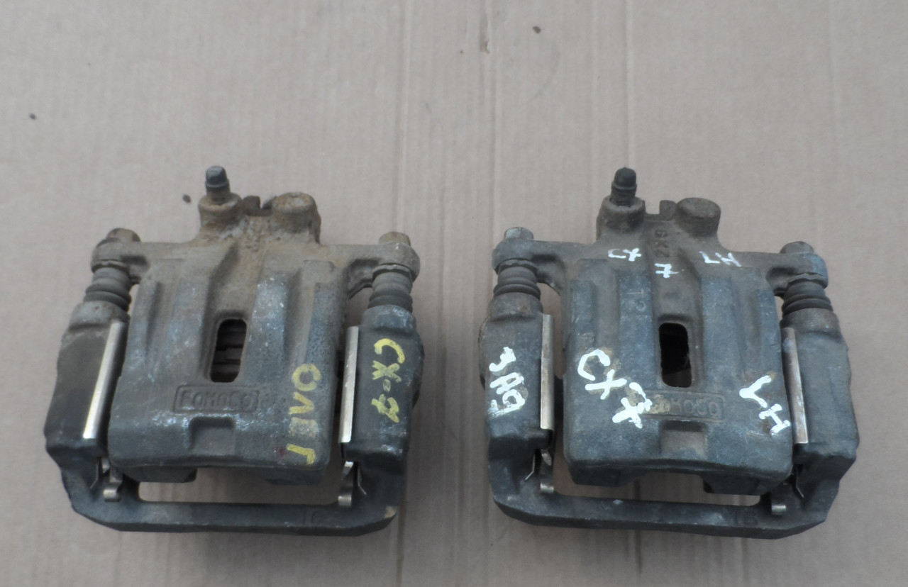 Суппорт задній лівий Mazda CX-7 2006-2012 L20626990C, фото 1