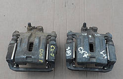 Суппорт задній лівий Mazda CX-7 2006-2012 L20626990C