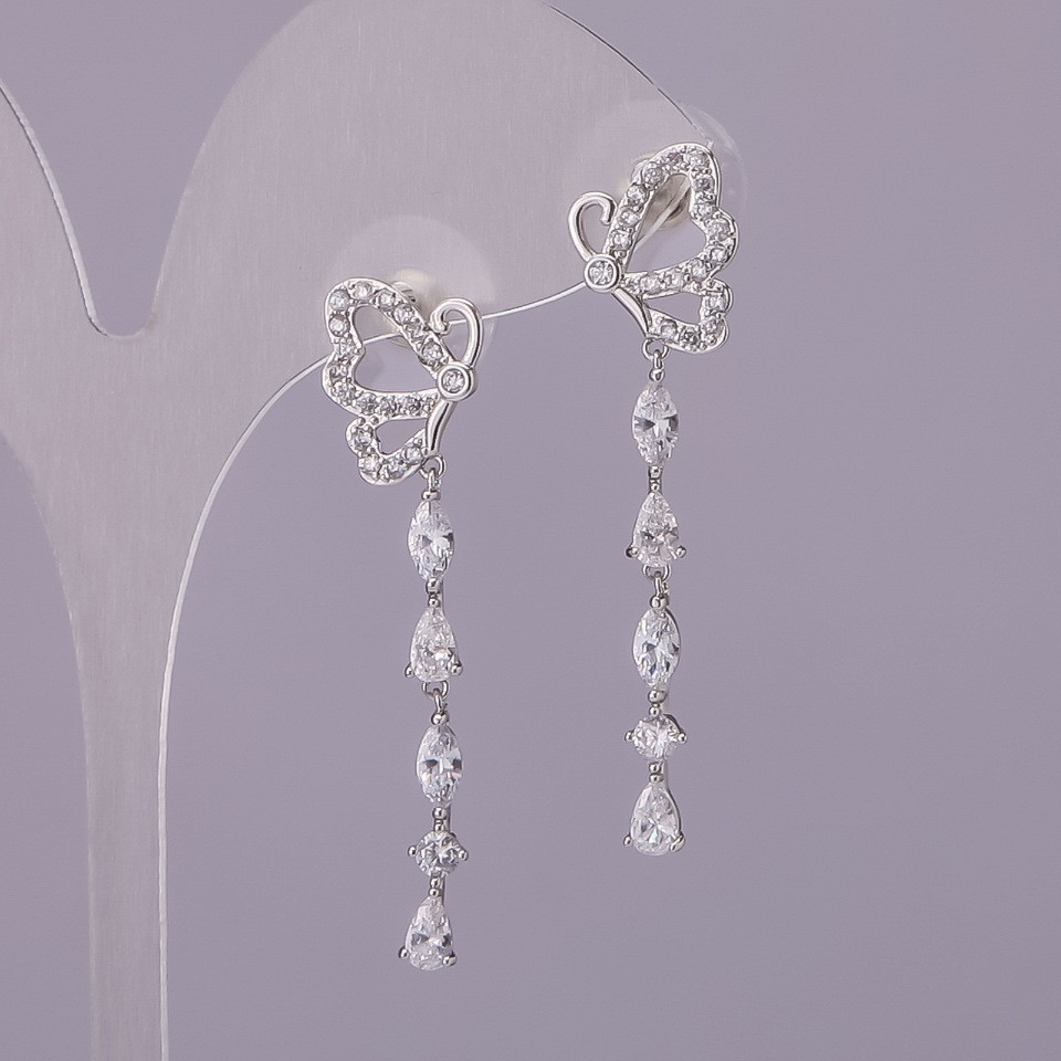 Сережки пусети Метелики білі кристали сріблястий метал 11х40мм, фото 1