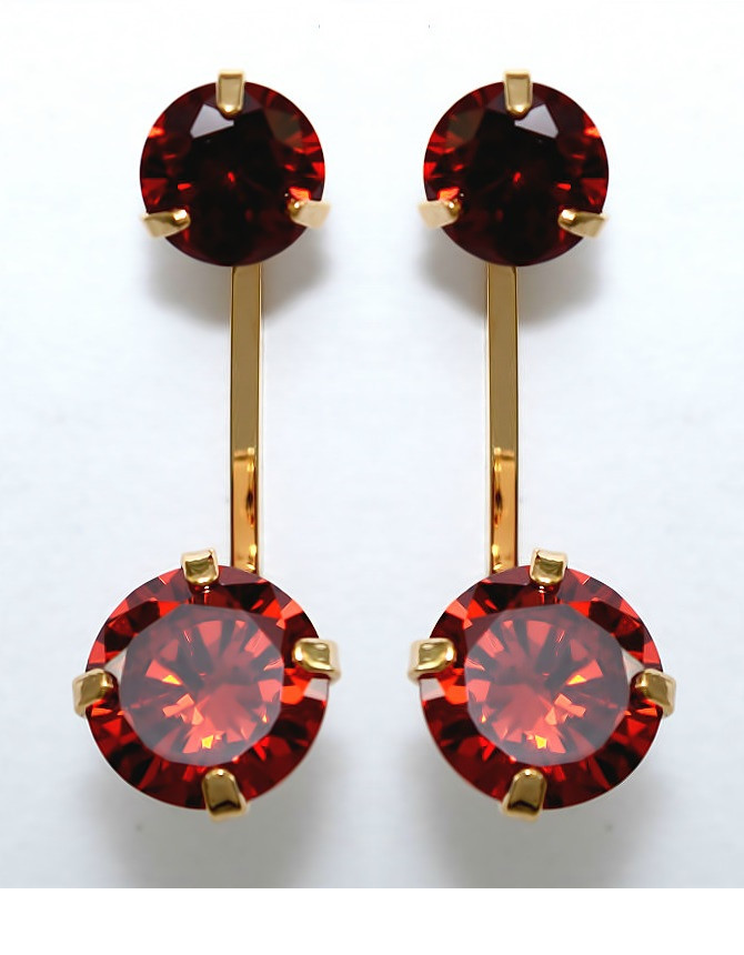 Сережки гвоздики. Оправа кольору: позолота. Камені: червоний циркон. Висота: 2.3 см. Ширина: 9 мм.