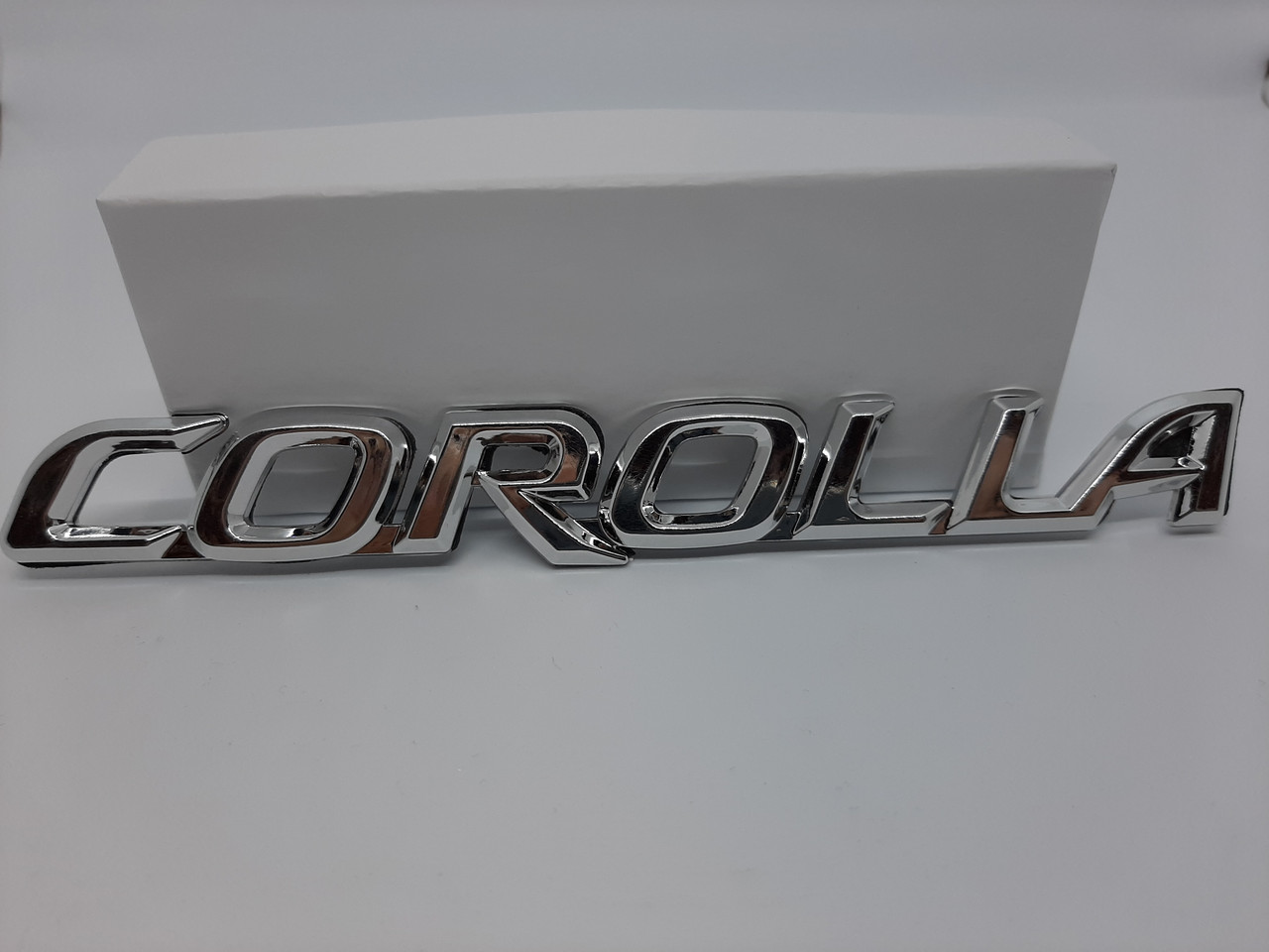 Емблема, логотип напис Corolla