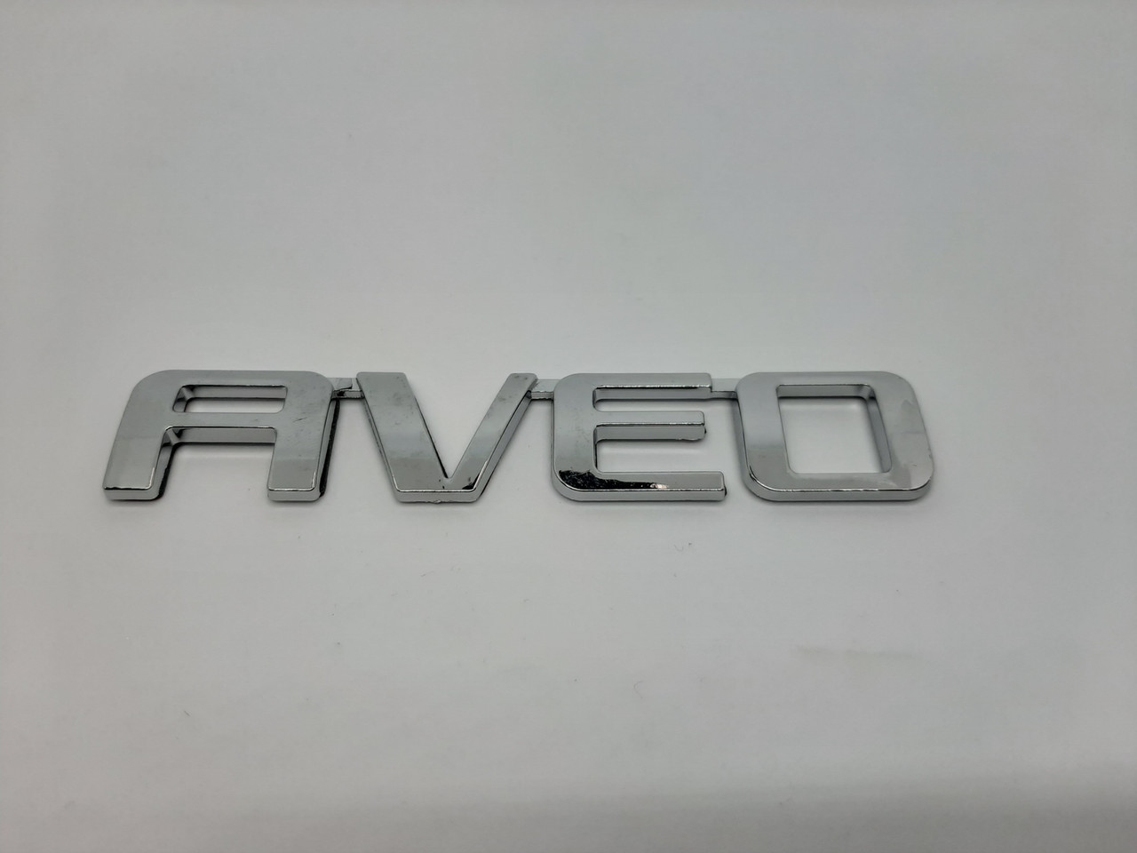 Емблема, логотип напис Aveo