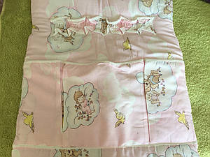 Кишеня в дитячу ліжечко.