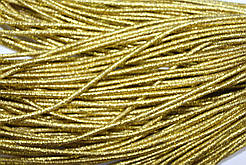 Гумка капелюшна, кругла 2,5мм золото моток 50м