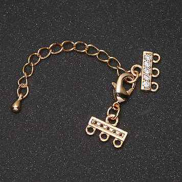 Замок для браслетів і бус на 3 нитки зі стразами і подовжувальним ланцюжком золотистий метал d-9х12мм L-5см