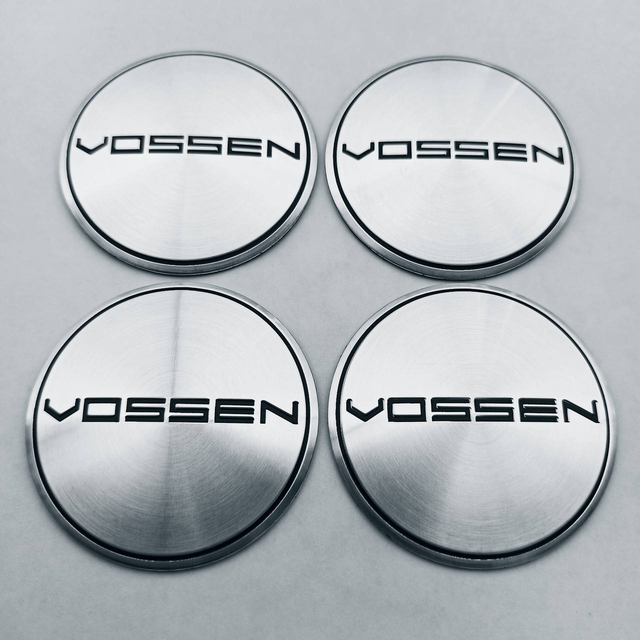 

Наклейка выпуклая на колпачок диска Vossen 56 мм серая, Светло-серый