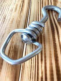 Вертлюг гачок великий