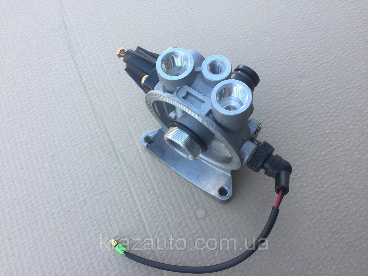 Кран вологовіддільника 4 виходи MB, MAN, IVECO, DAF (основа осушника) 44180082