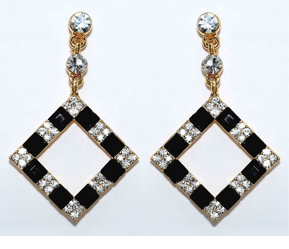 Сережки-гвоздики. Позолота. Камені: білий циркон. Довжина: 46 мм. Ширина: 29 мм.