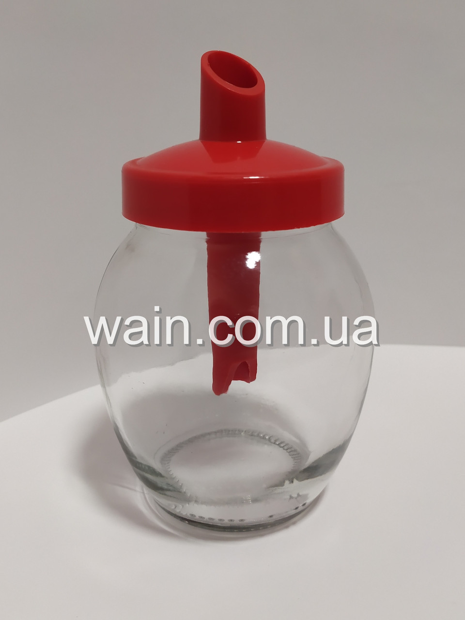 Цукорниця скляна 350 мл кругла з червоним пластиковим дозатором Everglass