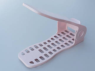 Подвійна підставка-органайзер для взуття ніжно-рожевого кольору. Регулюється по висоті в 4 положеннях.