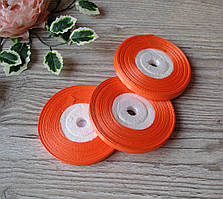 Стрічка атласна жовтогаряча неонова 0,6 см