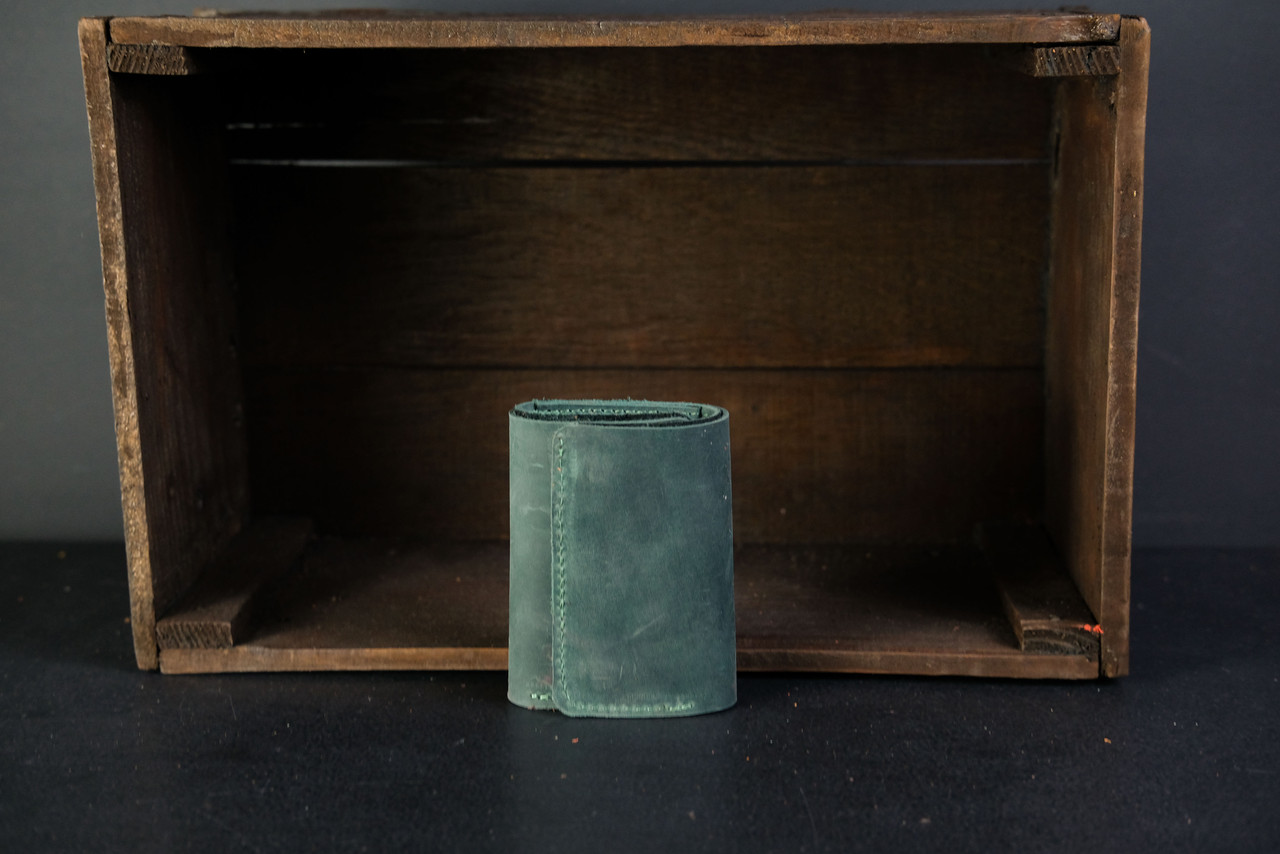 Жіночий гаманець потрійного складання з натуральної шкіри колір Зелений