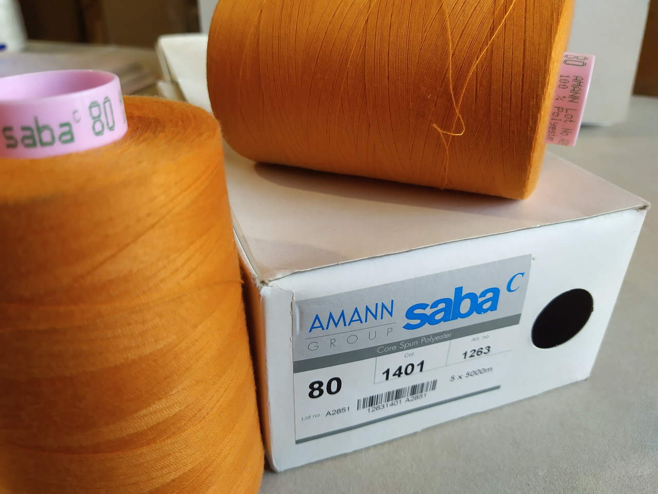 Нитки армированные AMANN Saba C №80 5000м акционный цвет (1401) оранжевый - фото 1 - id-p1161524519