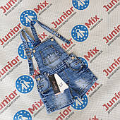 Оптом дитячі джинсові шорти комбінезони для дівчаток на 4-14 років.