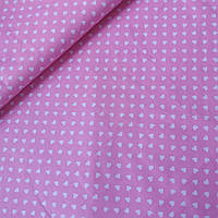 Тканина з дрібними білими сердечками на яскраво-рожевому тлі, ширина 160 см