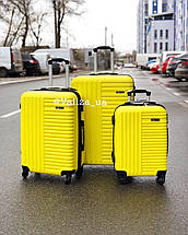 Пластиковий чемодан на 4-х колесах якісний жовтий чемодан / Пластикова валіза жовта, фото 3