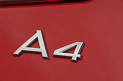 Емблема напис багажника Audi А4