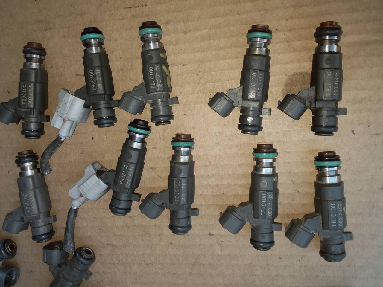 Форсунки Nissan серые FBJC100 166005L700