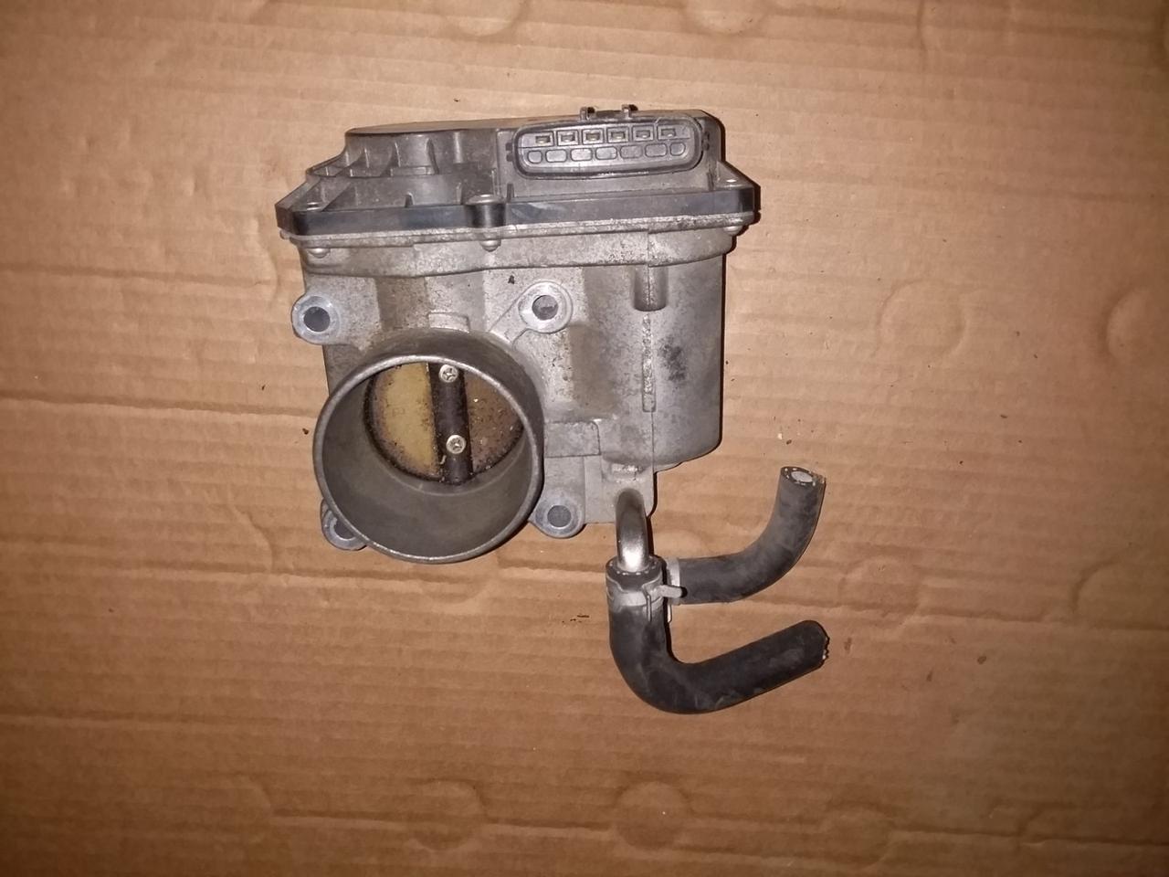 Дросельна заслінка Mitsubishi Colt 4G19 mn137645