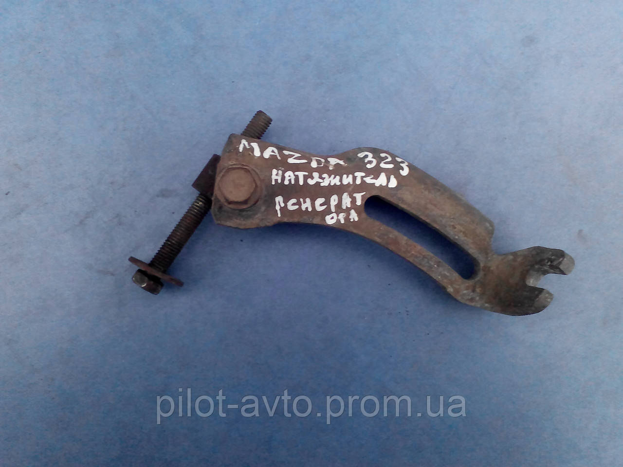 Натягувач генератора B6BF-18-361C Mazda 323