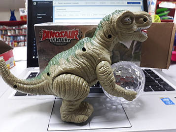 Динозавр пластиковий музичний світиться з кулею їздить