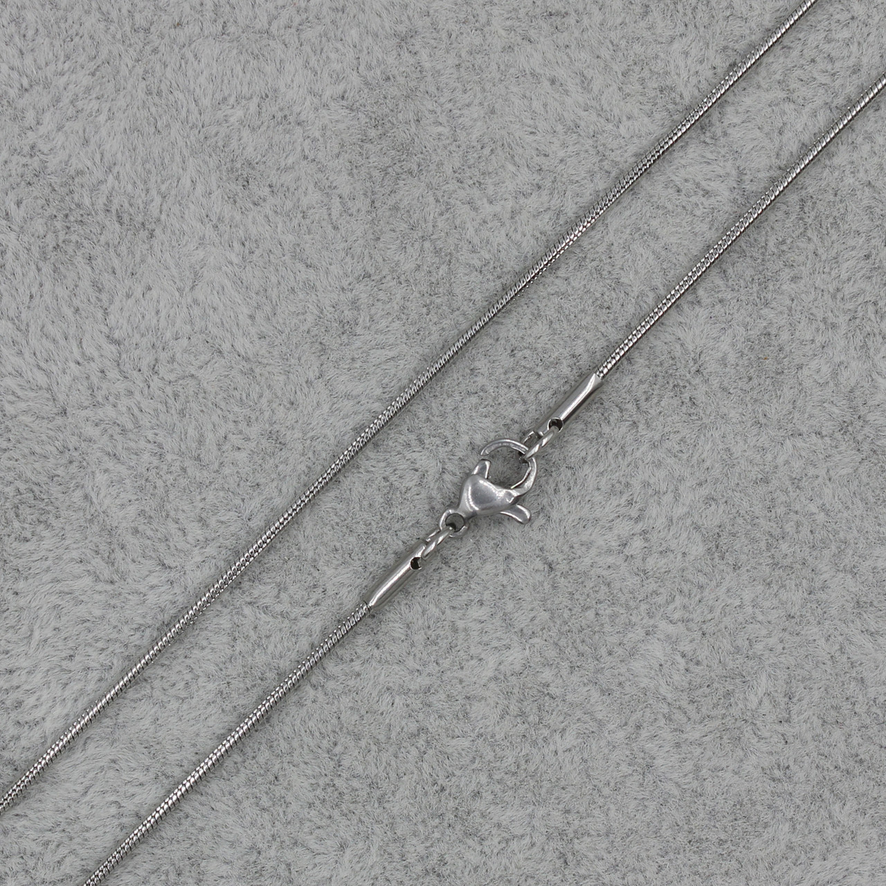 Ланцюжок сріблястий плетіння снейк круглий із неіржавкої сталі Stainless Steel довжина 55 см ширина 2 мм