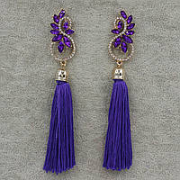 Сережки пензля жіночі гвоздики золотистого кольору довгі об'ємні синьо-фіолетового кольору в стразах довжина 12 см