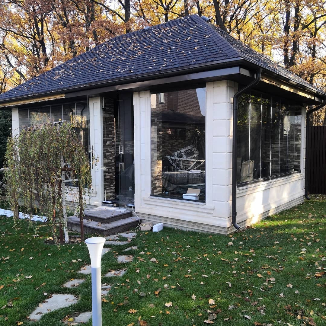 Розсувна система "Книжка" безрамного скління терас, веранд, альтанок