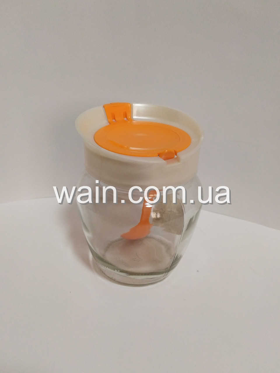 Скляна ємність 550 мл помаранчева для харчових продуктів з пластиковою кришкою і ложкою Everglass
