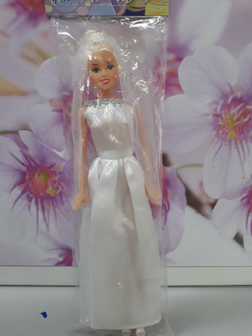 Лялька в білому весільному платті білі волосся