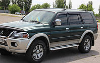 Пороги боковые (подножки-площадка) Mitsubishi Pajero Sport 1996-2008 (Ø42)