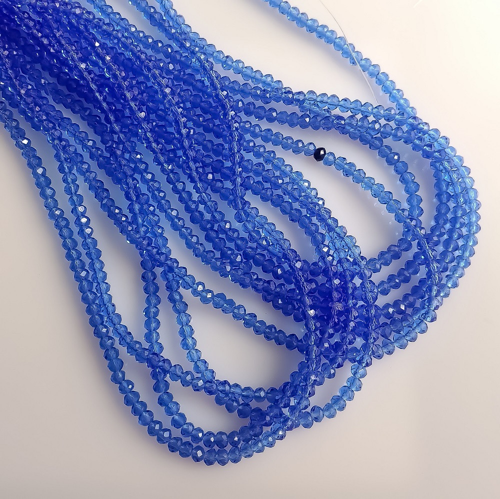 Намистини Чеський Хрусталь прозоре блакитне василькове "рондель" d-3,5х2,5мм нитка L-40см купити біжутерію дешево оптом в