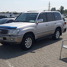 Дефлектори вікон (вітровики) Toyota Land Cruiser 100 / LX470 Euro 1998-> 4D 4шт (HIC)