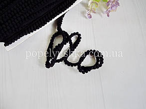 Помпони на тасьмі чорні