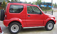 Пороги боковые (подножки-трубы) Suzuki Jimny 1998+ (Ø60)