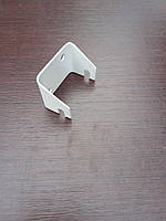 Кріплення біле для торгової сітки до стіни