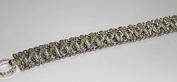 Жіночий срібний браслет прикрашений цирконами широкий ажурний масивний Достаток