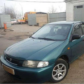 Дефлектори вікон вітровики Мазда 323 Mazda 323 (BA, BH) 94-00  КТ (Накладні)