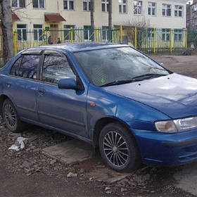 Дефлектори вікон вітровики Ніссан Альмера Nissan Almera (N15) 95-00  КТ (Накладні)